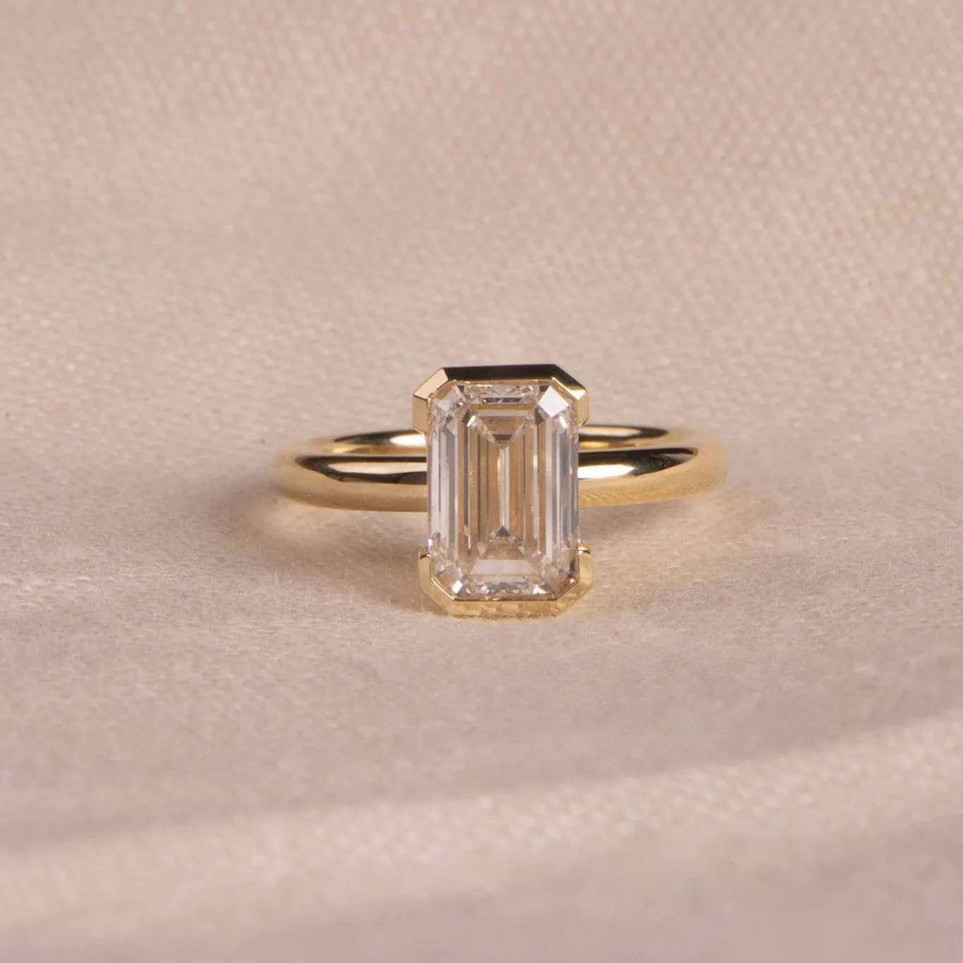 2.79ct Edith | Half Bezel Emerald Cut Engagement Ring | R2W