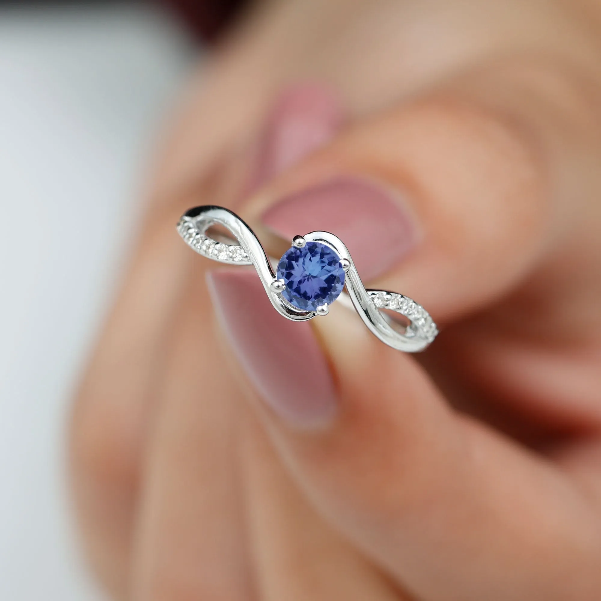 Tanzanite and Diamond Solitaire Bypass Ring