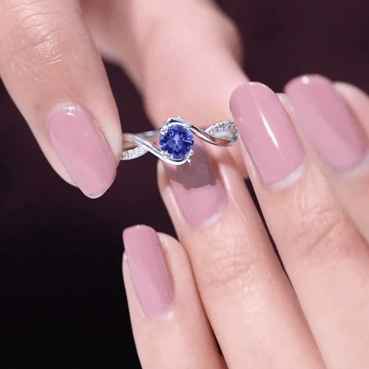 Tanzanite and Diamond Solitaire Bypass Ring